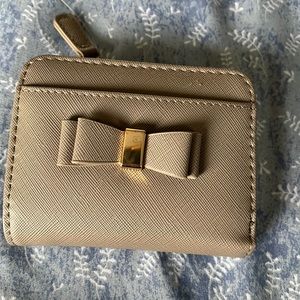 Small billfold wallet new without tags grey color.